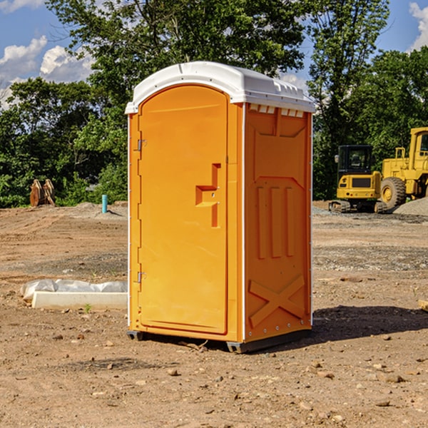 how often are the portable restrooms cleaned and serviced during a rental period in Woodlawn Heights